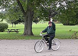 Father Herttna, on his bike